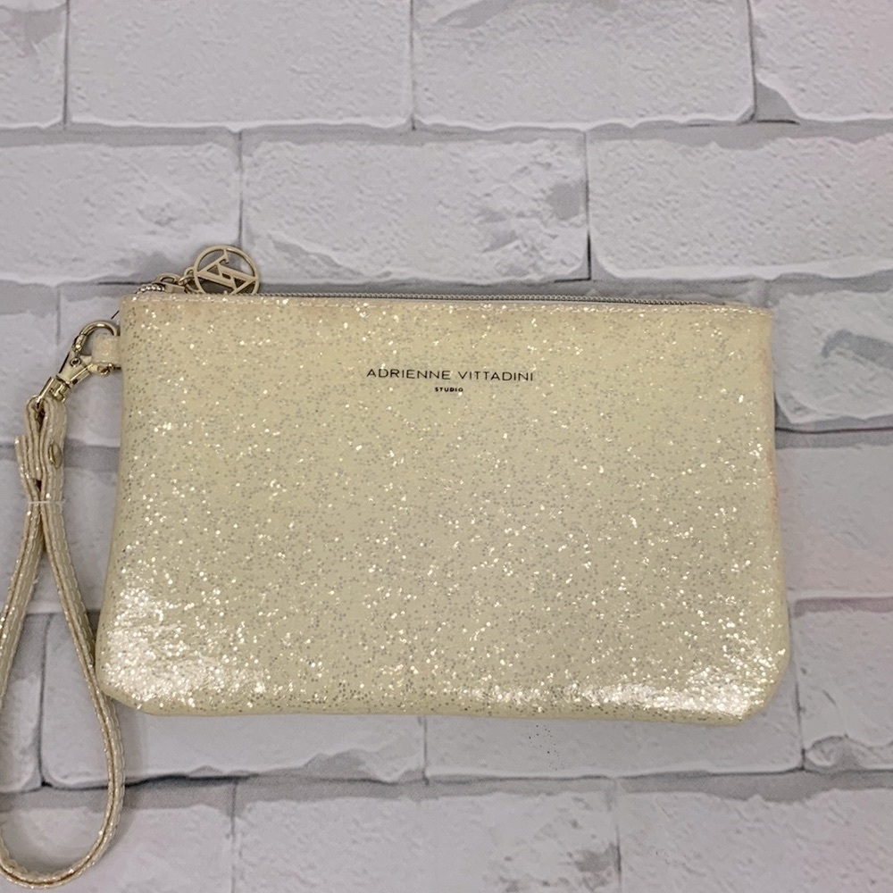 Adrienne Vittadini Gold sparkle wristlet pouch with charger New NWOT